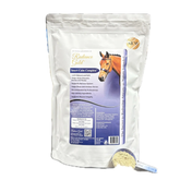 Bag of Radiance Gold with a scoop of the supplement on a white background